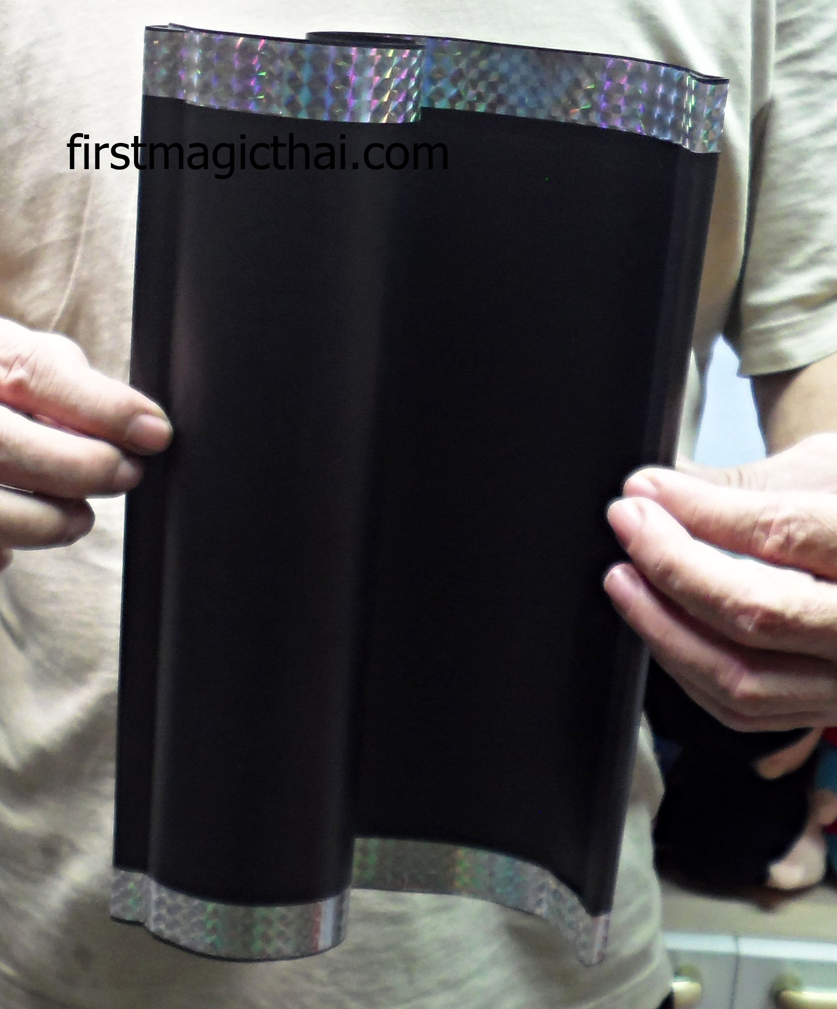 กระบอกเสกผ้า