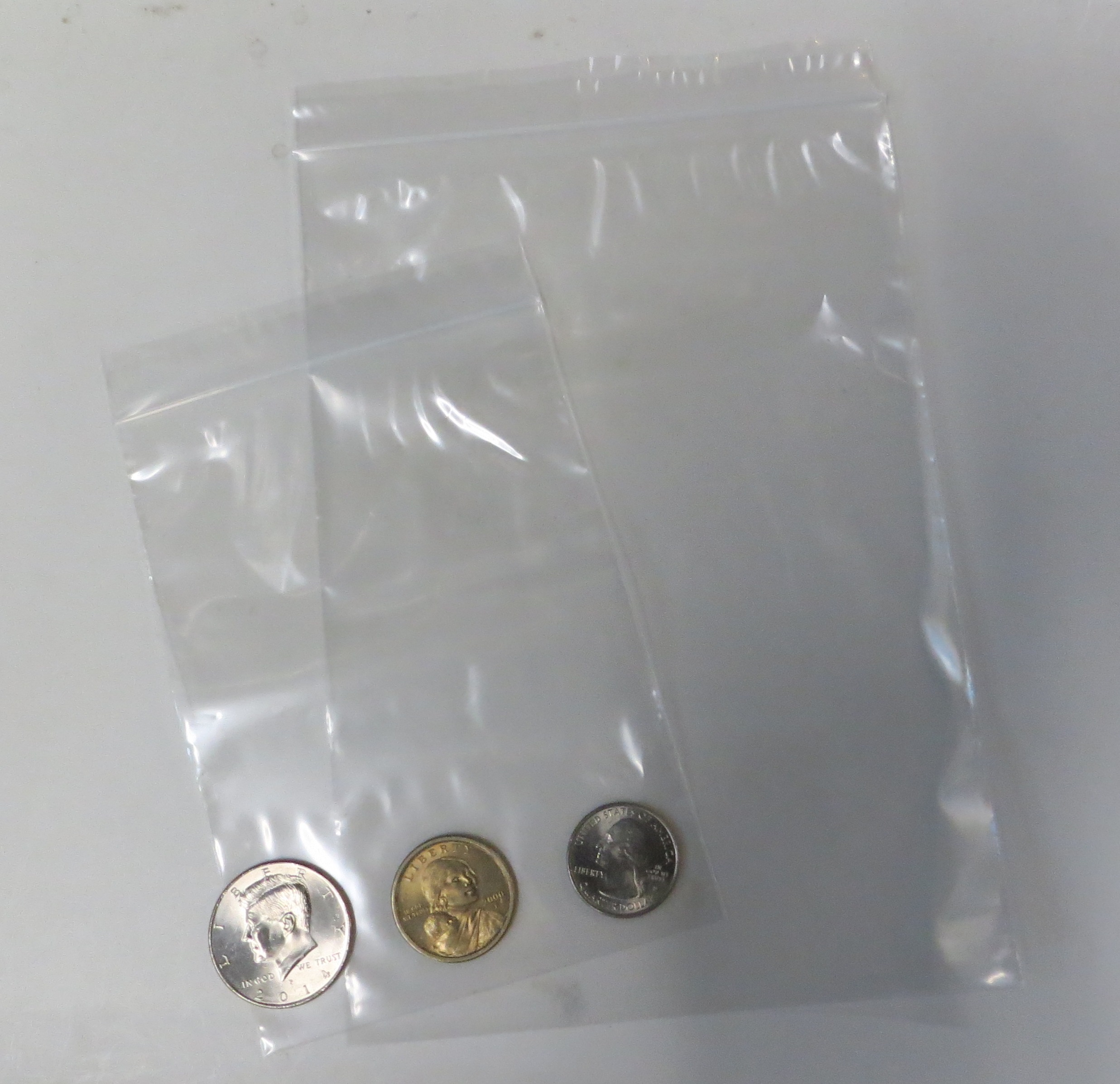 เหรียญ ทะลุถุง2ชั้น (NEW)