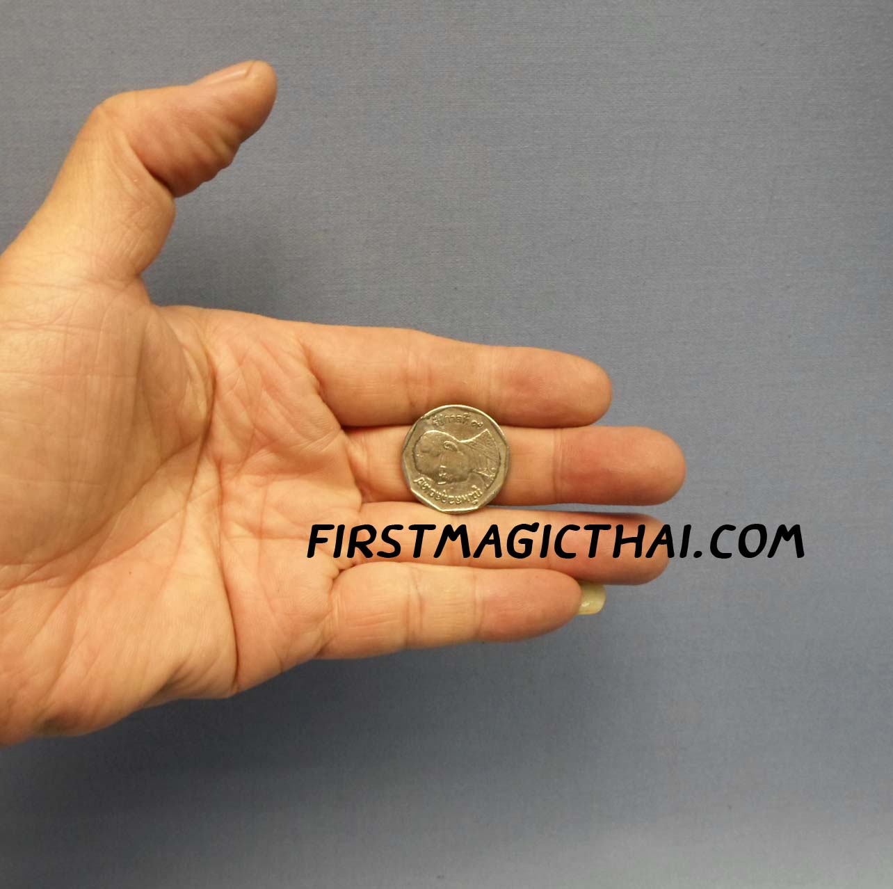 เปลี่ยนเหรียญ กลางอากาศ