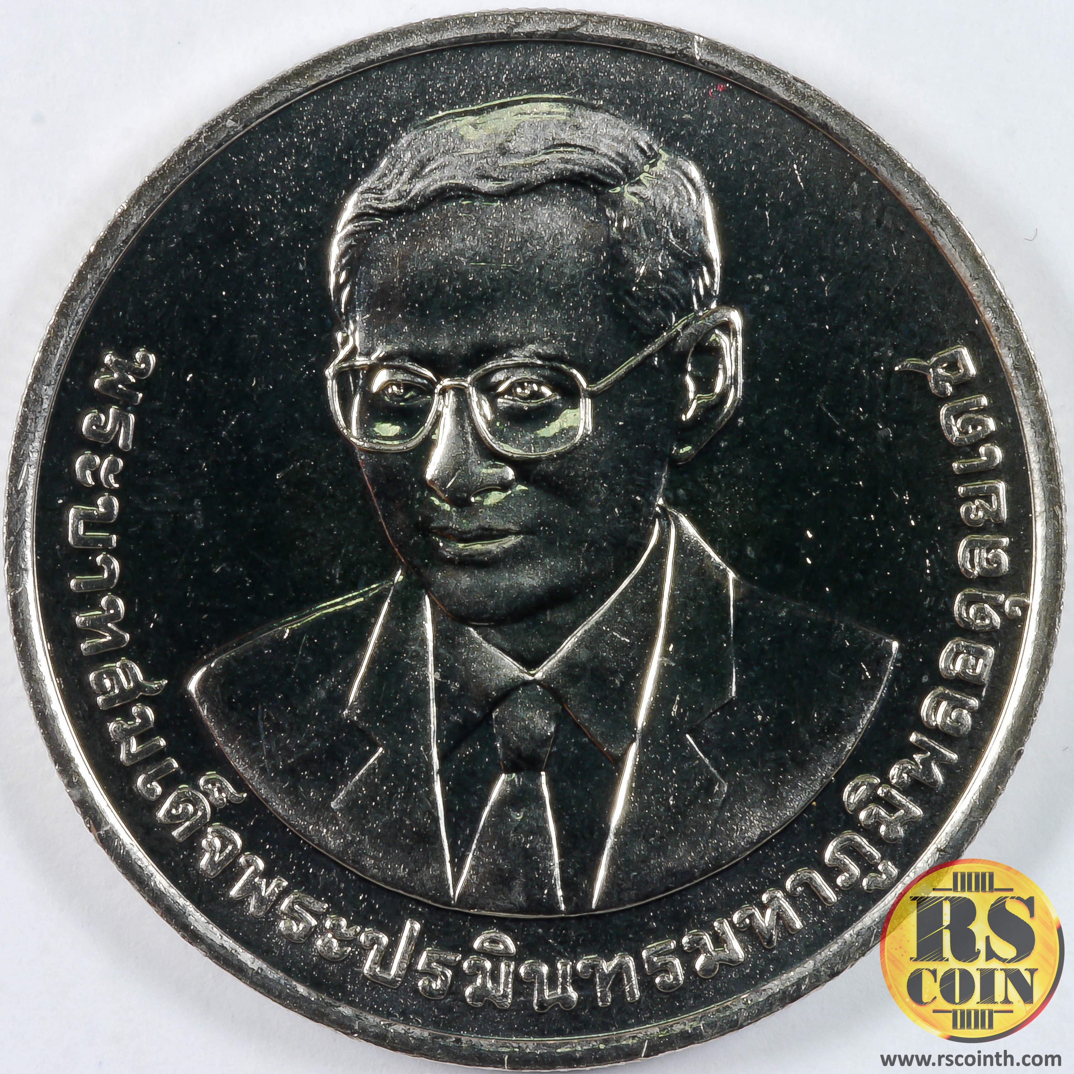 เหรียญกษาปณ์โลหะสีขาว (คิวโปรนิกเกิล) เหรียญกษาปณ์ที่ระลึก ครบ 50 ปี แห่งการสถาปนา มหาวิทยาลัยเชียงใหม่ 21 มกราคม 2557