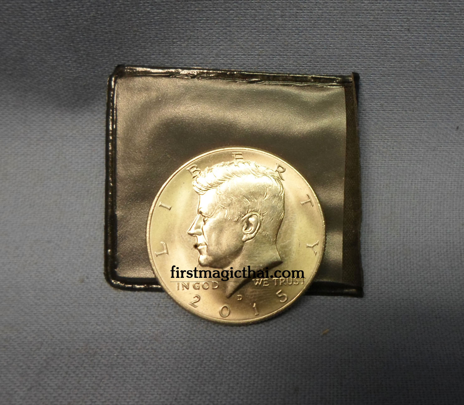 เหรียญฉีดน้ำ / Squirting Half Dollar
