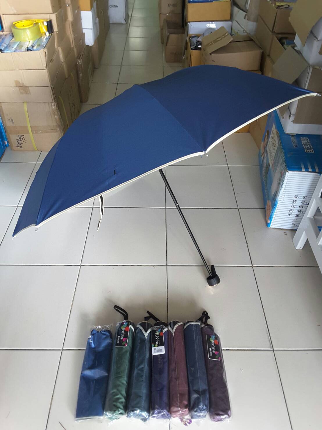 ร่มพับ3ตอนสีพื้นยูวีนอก