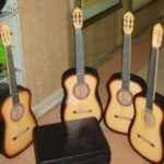 Four Appearing Guitars From Suitcase