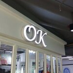 งานป้ายกล่องไฟออกหน้า ยกขอบคนสีขาว ร้านโอเค OK